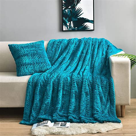 Manta para sofa azul turquesa .